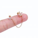 piercing perforacion oreja okami joyeria mexico queretaro con cadena flor