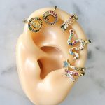 piercing falso oreja baño de oro dorado extrella serpiente okami joyeria queretaro mexico