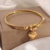 Pulsera rigida dorada corazon